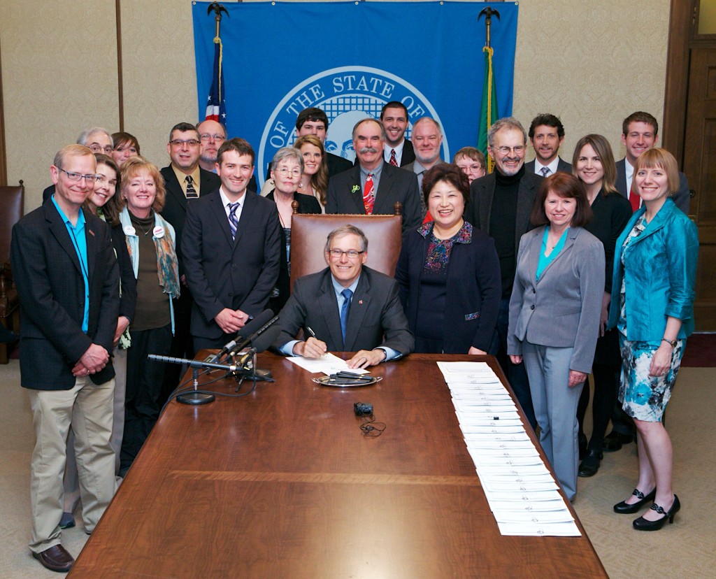 On May 16 supporters joined with Governor Inslee to sign HB 1045 into law