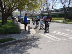 Kids on bikes learning safety skills.