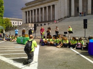 Gov. Jay Inslee shakes hands with the young outdoor adventurers preparing for their campout at the capitol.