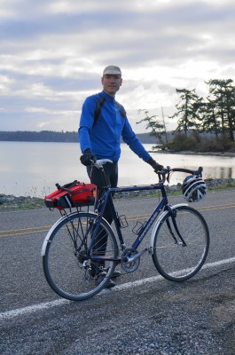 Brian Wood, student in UW master's in sustainable transportation, with his bicycle at Penn Cove, Island County, WA