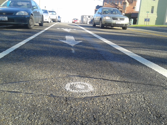 See a diamond cut in the pavement on your bike lane or trail? You might count! Photo courtesy of City of Tacoma